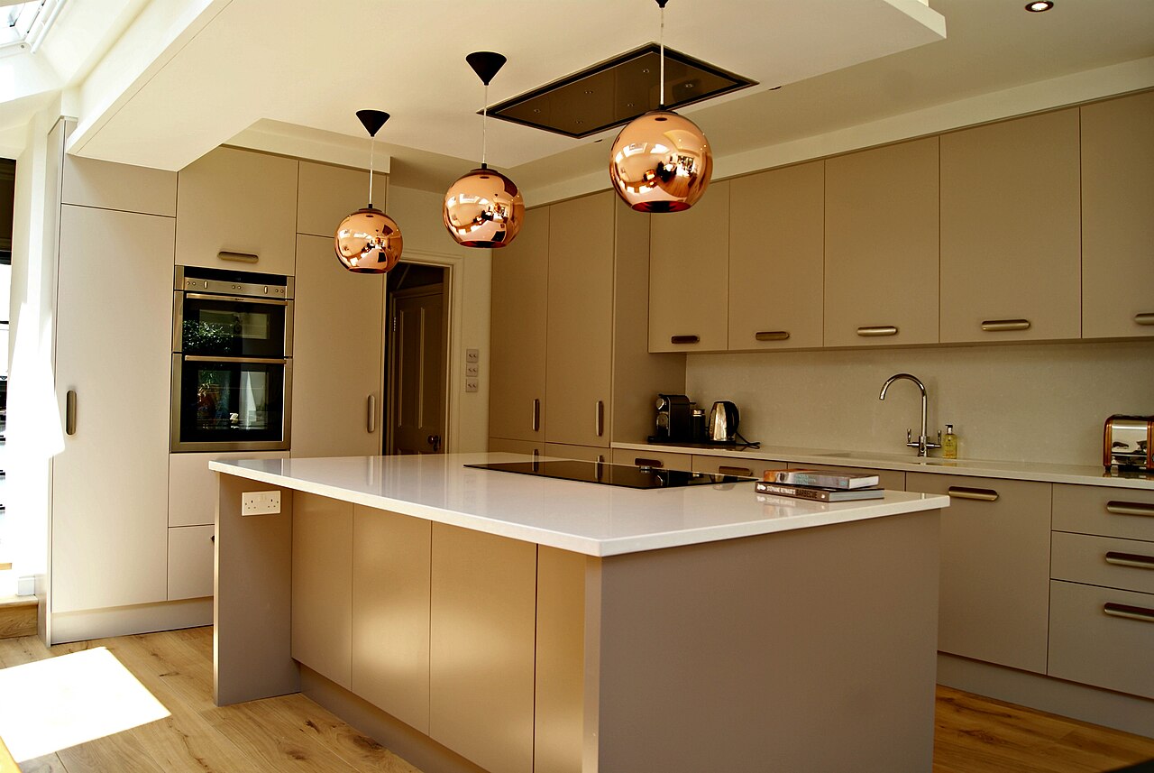 Fully renovated modern kitchen with island and pendant lighting
